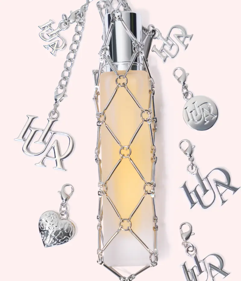 Travel Spray Fragrance Holder With Charms Huda Beauty — embalagem e produto