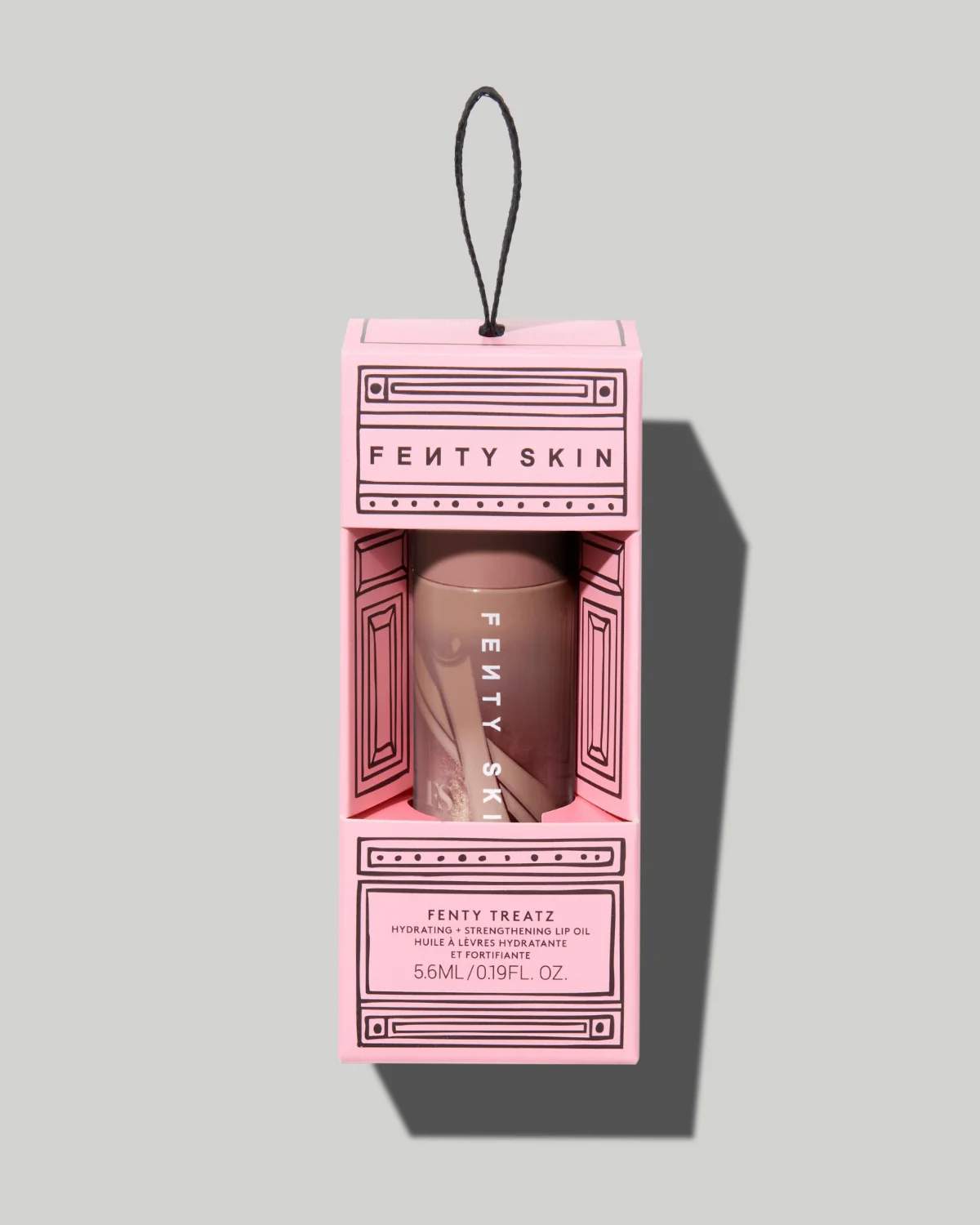 Foto de Fenty Treatz Hydrating + Strengthening Lip Oil — Cinnamon Sugar disponível em Luanda, Angola - Encomenda Online